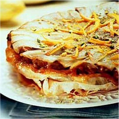 Tatin d'endives et souris d'agneau confite, liqueur d'érable à l'orange anisée, pistaches concassées